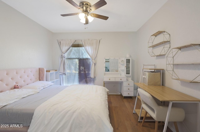 bedroom featuring dark hardwood / wood-style floors and ceiling fan