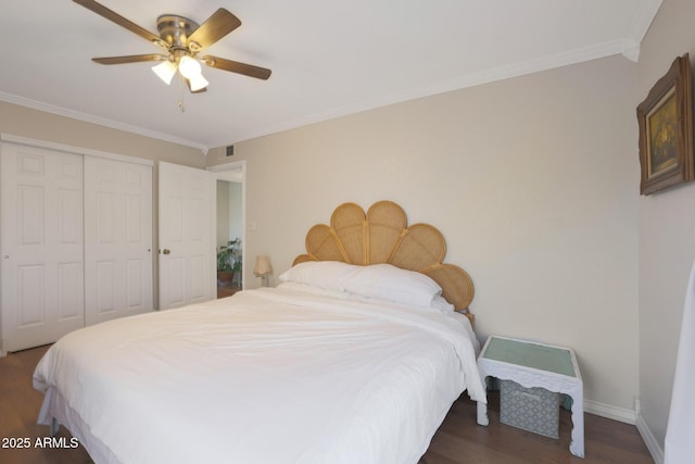 bedroom with ornamental molding, a closet, ceiling fan, and dark wood-type flooring