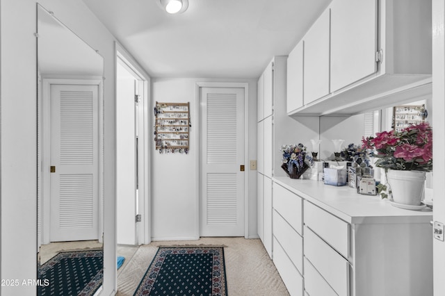 kitchen with white cabinetry