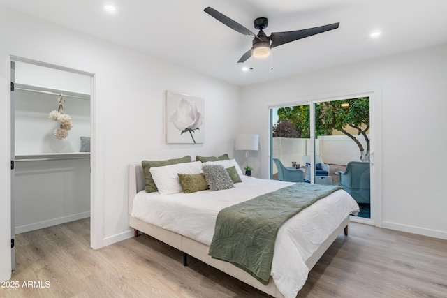 bedroom featuring light wood-type flooring, access to exterior, and ceiling fan