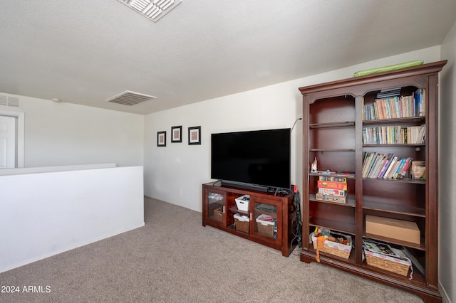 living room with light colored carpet