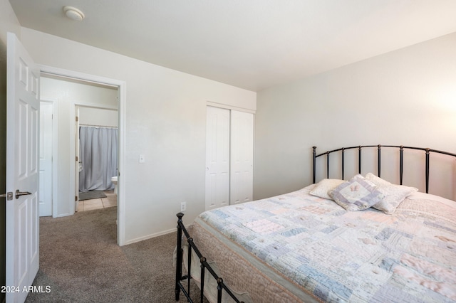 carpeted bedroom featuring a closet