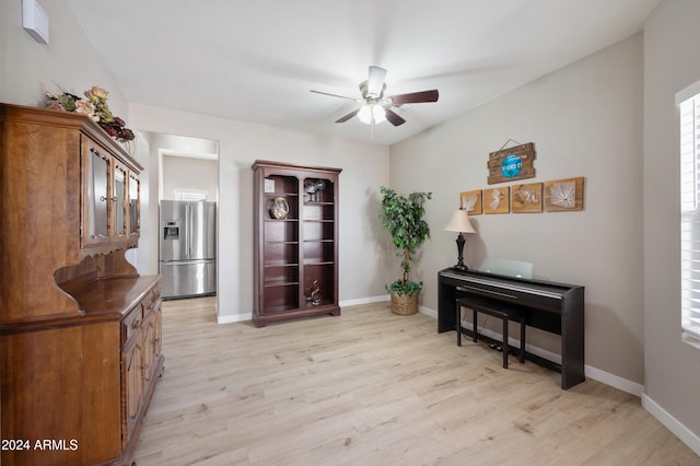 miscellaneous room with light hardwood / wood-style floors and ceiling fan