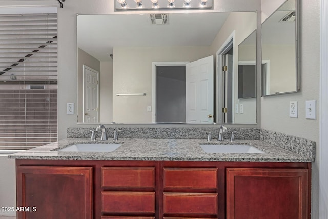 681 W Racine Loop, Casa Grande, AZ 85122 - bathroom featuring double vanity