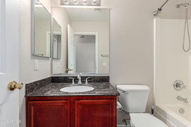 681 W Racine Loop, Casa Grande, AZ 85122 - bathroom with toilet, shower / bathtub combination, and vanity