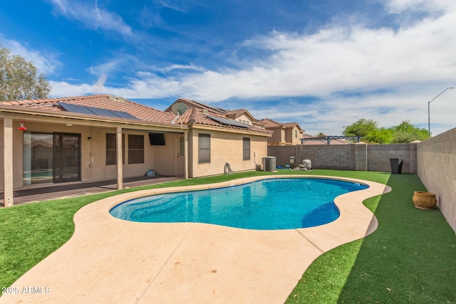 681 W Racine Loop, Casa Grande, AZ 85122 - view of pool featuring central AC and a patio