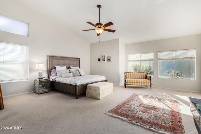 bedroom featuring light carpet, high vaulted ceiling, and ceiling fan