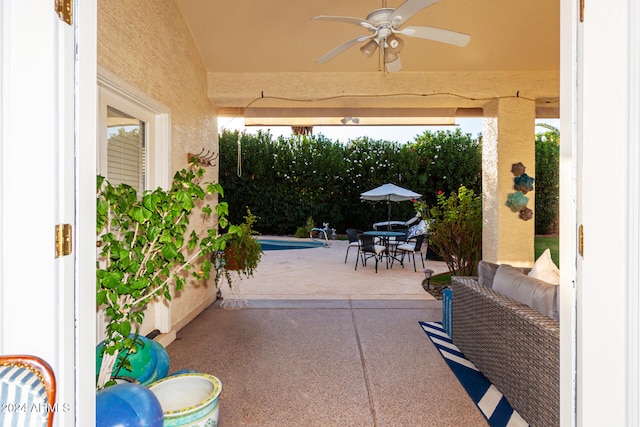 view of patio / terrace featuring ceiling fan