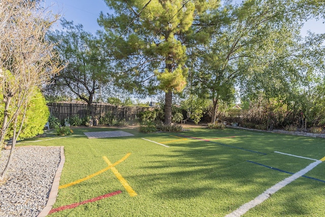 view of yard featuring fence