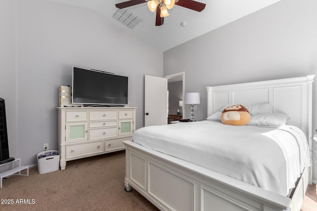 carpeted bedroom featuring ceiling fan and vaulted ceiling