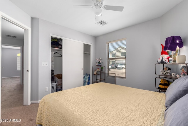 bedroom with carpet flooring, ceiling fan, and a closet