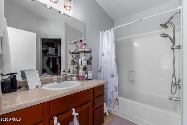 bathroom featuring shower / tub combo with curtain and vanity