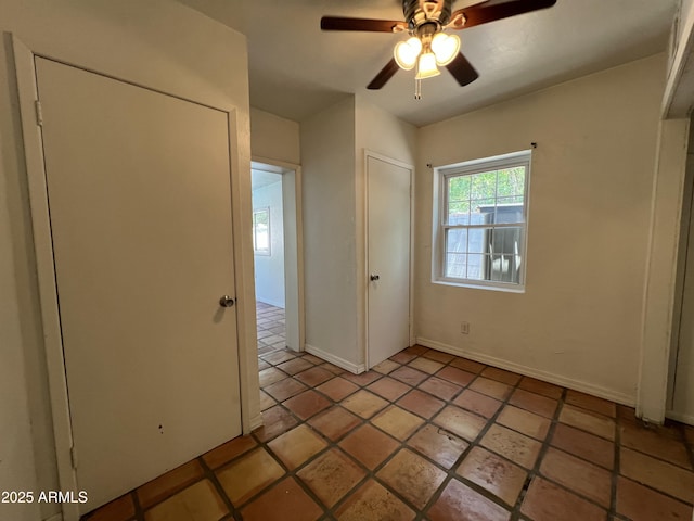 1618 W Vernon Ave, Phoenix, AZ 85007 - unfurnished bedroom with baseboards and a ceiling fan