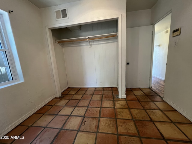 1618 W Vernon Ave, Phoenix, AZ 85007 - unfurnished bedroom featuring a closet and baseboards