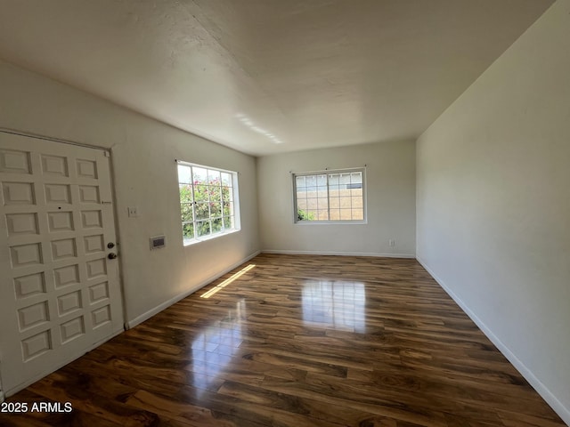 1618 W Vernon Ave, Phoenix, AZ 85007 - unfurnished room with dark wood finished floors and baseboards