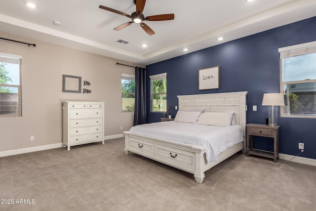 carpeted bedroom featuring baseboards, visible vents, and recessed lighting