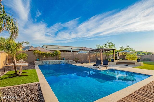 view of pool featuring a gazebo, a fenced backyard, a fenced in pool, and a patio area