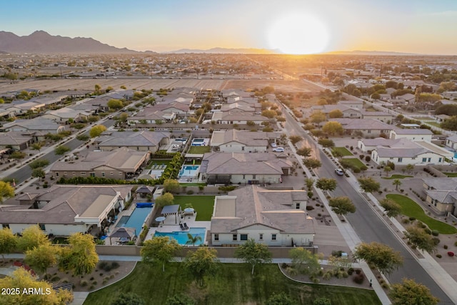 drone / aerial view featuring a mountain view and a residential view