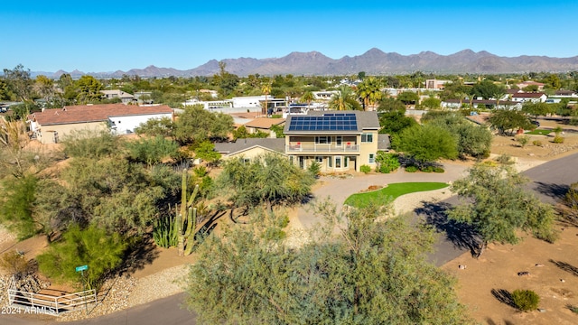 drone / aerial view featuring a mountain view