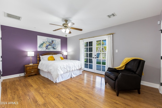 bedroom featuring ceiling fan, wood-type flooring, access to outside, and french doors