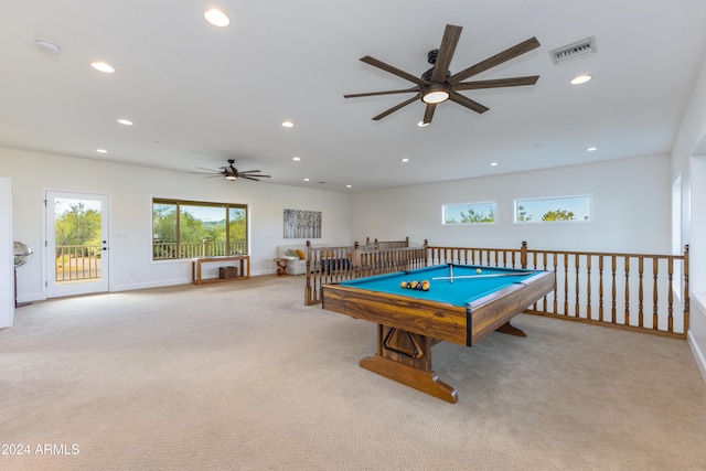 rec room featuring light carpet, ceiling fan, and pool table