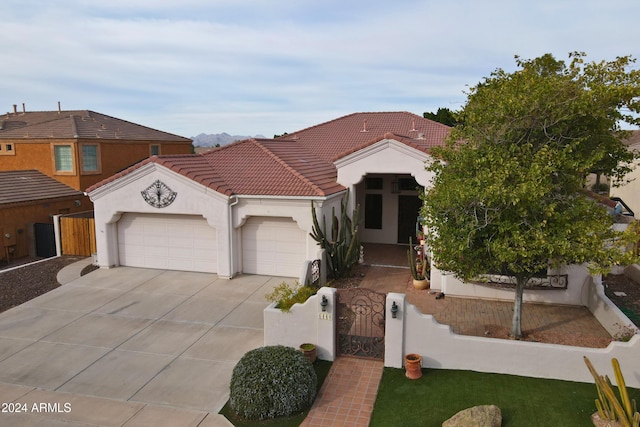 view of front of home with a garage