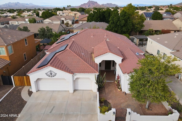 drone / aerial view featuring a mountain view