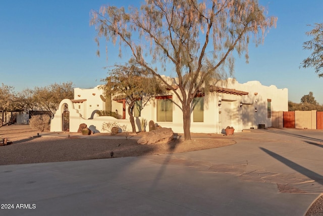 view of pueblo revival-style home