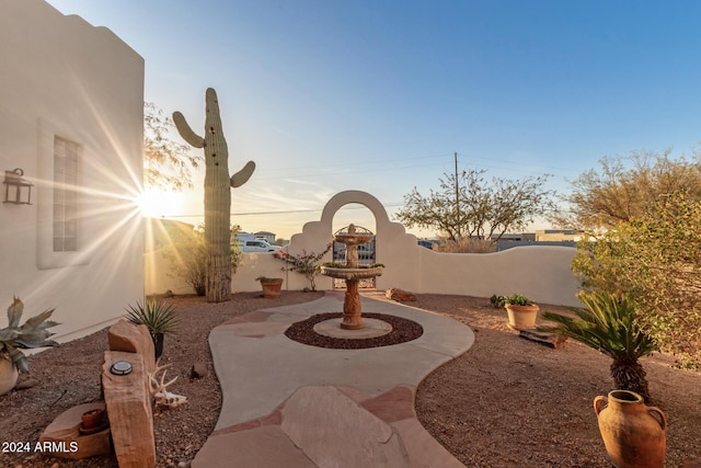 view of patio terrace at dusk