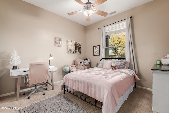 bedroom with light colored carpet and ceiling fan