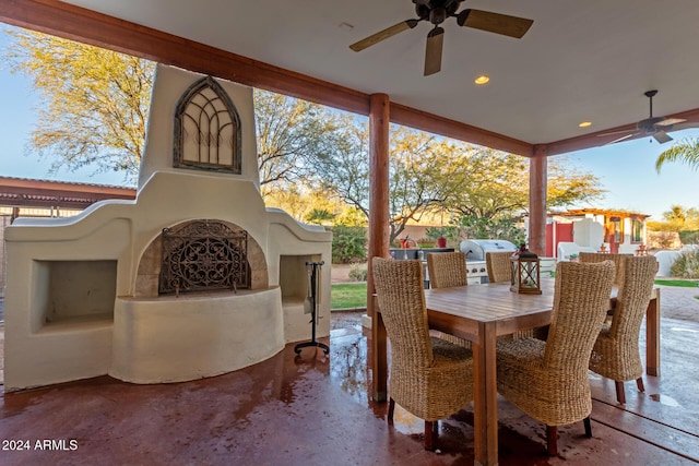 view of patio / terrace with ceiling fan and area for grilling