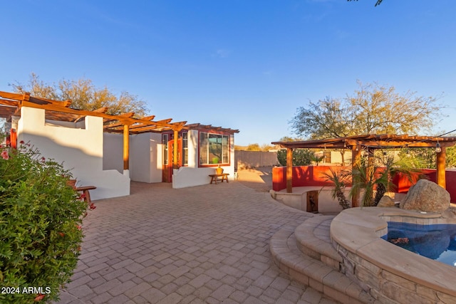 view of patio featuring a pergola