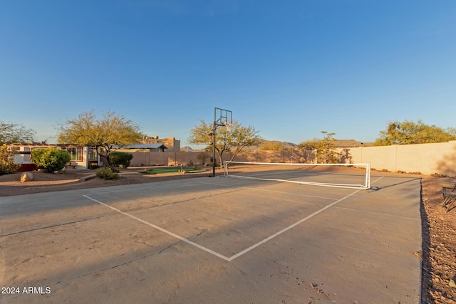 view of basketball court featuring tennis court