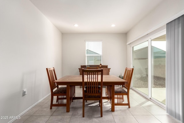 dining room featuring recessed lighting, light tile patterned flooring, and baseboards