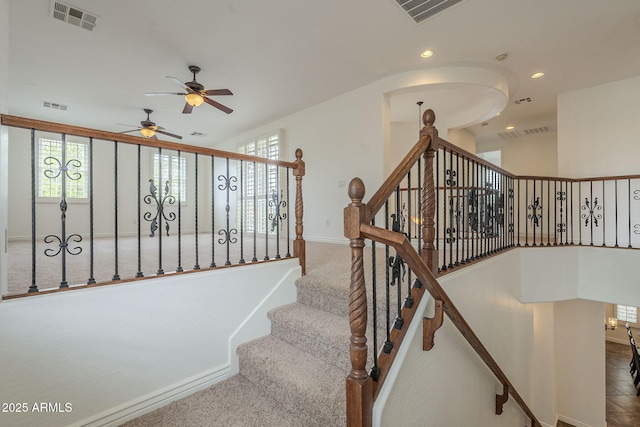 staircase featuring recessed lighting, visible vents, and a ceiling fan