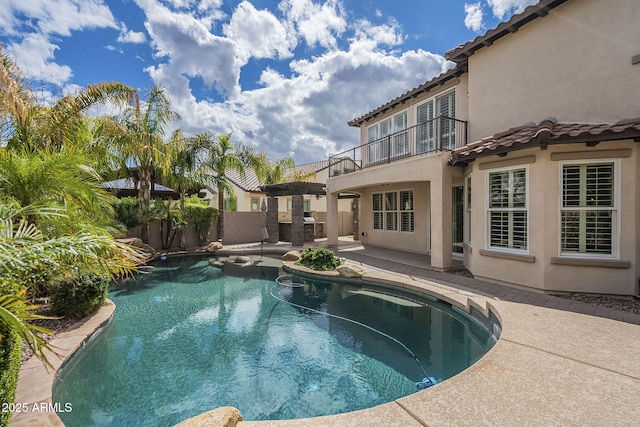 view of swimming pool featuring a fenced in pool, a patio, and a fenced backyard