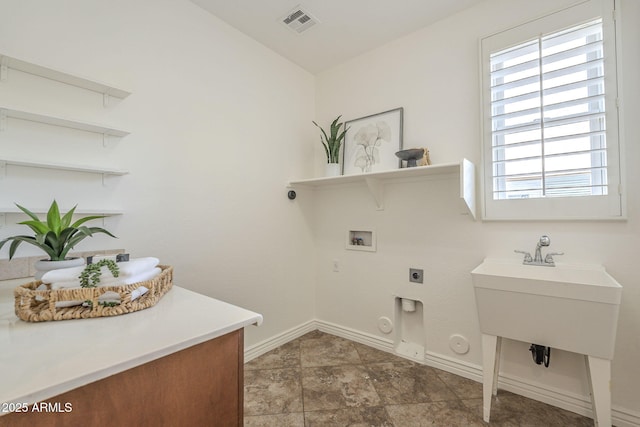 laundry room featuring visible vents, gas dryer hookup, hookup for an electric dryer, hookup for a washing machine, and laundry area