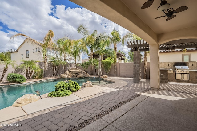 view of swimming pool with area for grilling, a fenced in pool, a patio, and a fenced backyard