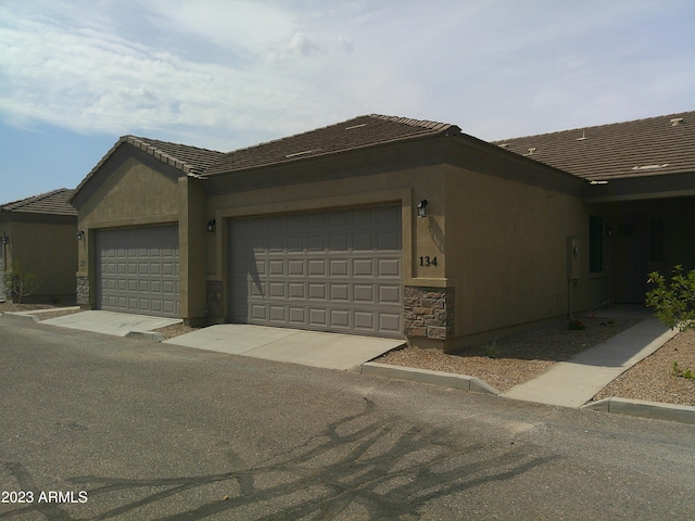 view of front of home with a garage