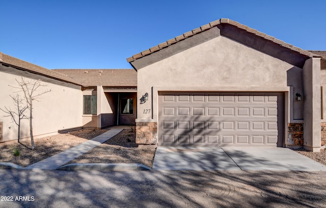 view of front of home featuring a garage