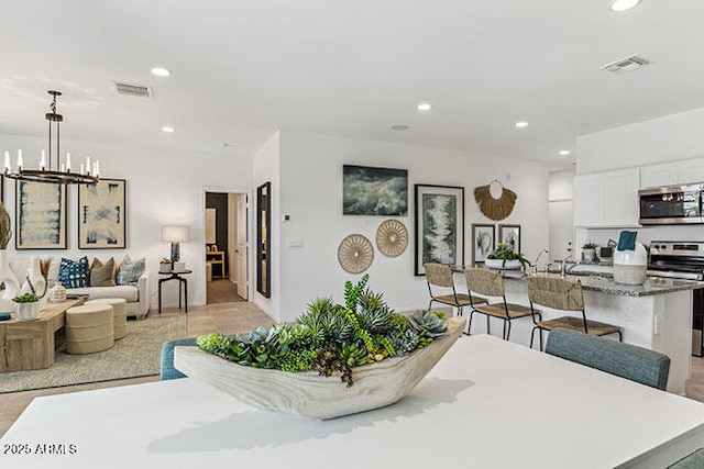 dining room with an inviting chandelier