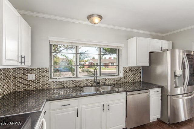 2938 N 18th Ave, Phoenix, AZ 85015 - kitchen featuring stainless steel appliances, a sink, ornamental molding, white cabinetry, and backsplash
