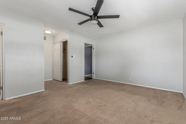 2938 N 18th Ave, Phoenix, AZ 85015 - unfurnished room featuring carpet floors, a ceiling fan, and baseboards