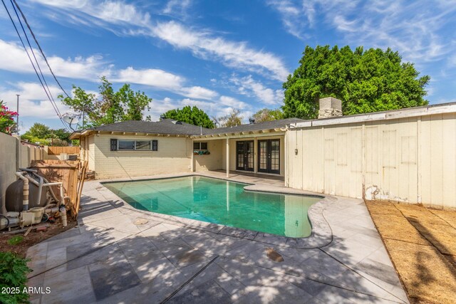 2938 N 18th Ave, Phoenix, AZ 85015 - view of swimming pool featuring a patio and french doors