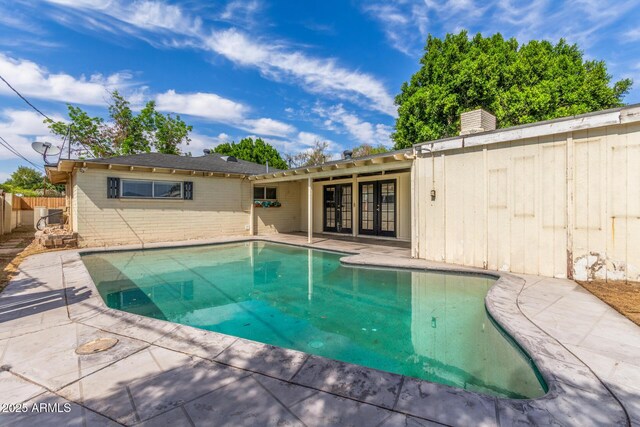 2938 N 18th Ave, Phoenix, AZ 85015 - view of pool featuring french doors and a patio area