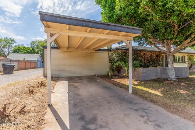 2938 N 18th Ave, Phoenix, AZ 85015 - view of parking / parking lot with driveway and an attached carport