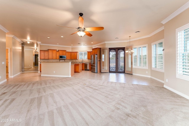 7969 S 172nd St, Queen Creek, AZ 85142 - unfurnished living room with light colored carpet, baseboards, crown molding, recessed lighting, and ceiling fan