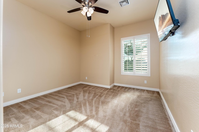 7969 S 172nd St, Queen Creek, AZ 85142 - spare room featuring carpet flooring, a ceiling fan, and baseboards