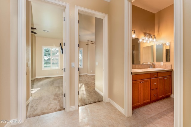 7969 S 172nd St, Queen Creek, AZ 85142 - bathroom with vanity, tile patterned floors, and baseboards