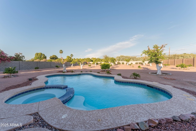 7969 S 172nd St, Queen Creek, AZ 85142 - view of swimming pool featuring a pool with connected hot tub and a fenced backyard